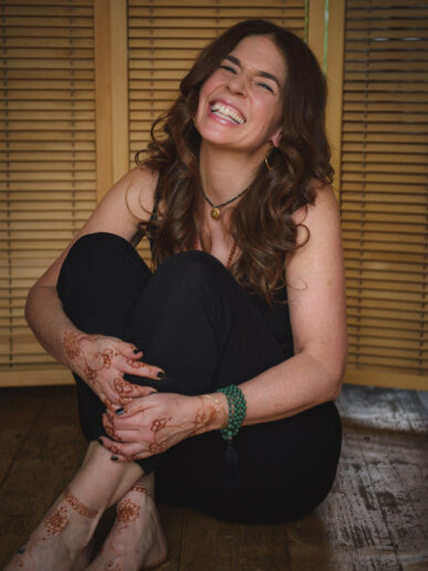 Yoga teacher having fun during her branding photoshoot