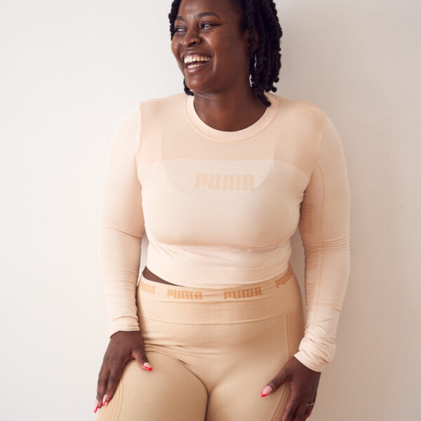 Happy Yoga instructor having her yoga branding photoshoot