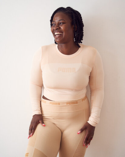 Happy Yoga instructor having her yoga branding photoshoot