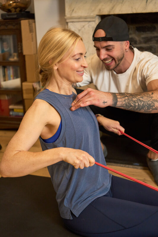 Fitness coach training with his client for a branding photoshoot in London