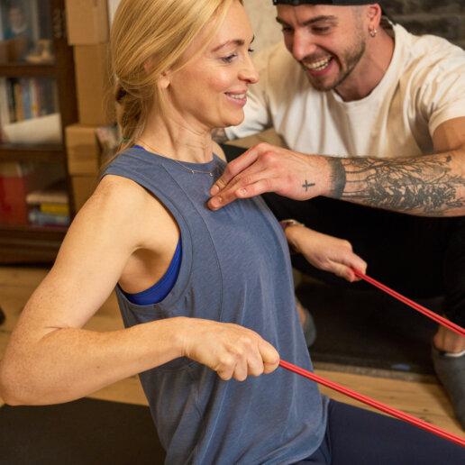 Fitness coach training with his client for a branding photoshoot in London