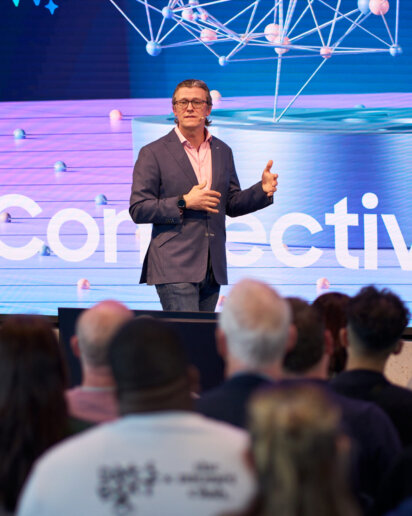 ceo on stage talking about new features from an event