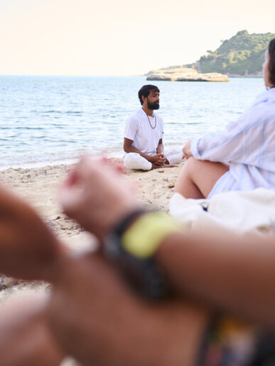 People mediating during a yoga retreat photoshoot