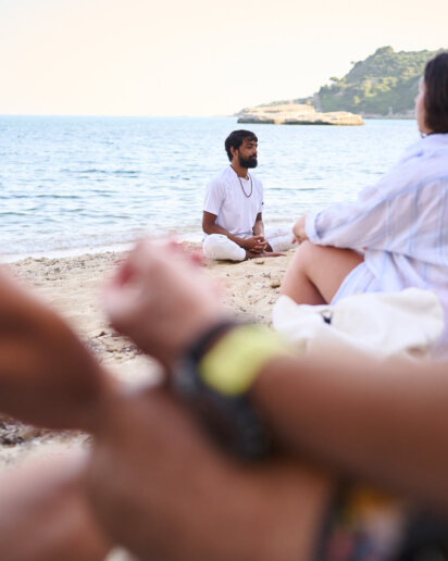 People mediating during a yoga retreat photoshoot