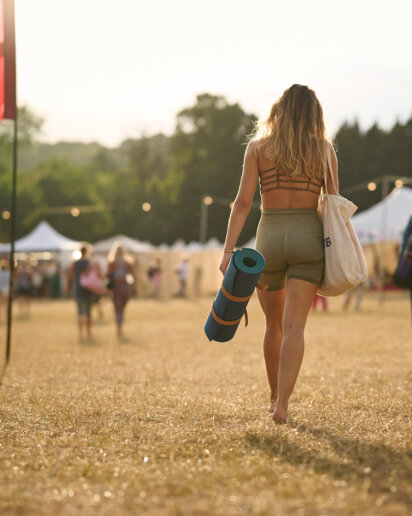 Sunset vibes at a festival, captured by a yoga photographer