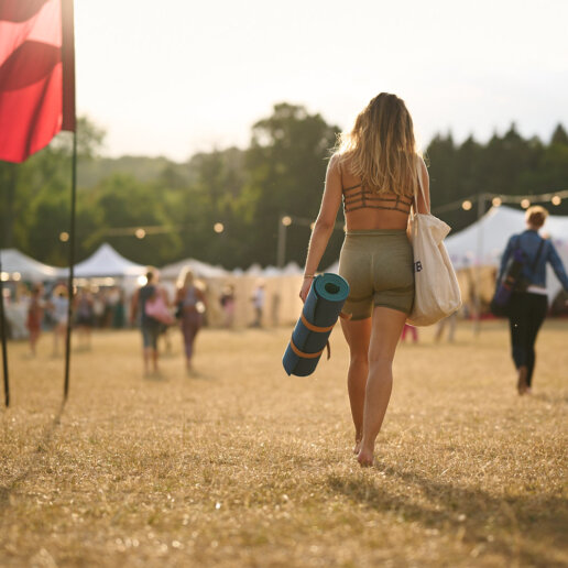 Sunset vibes at a festival, captured by a yoga photographer