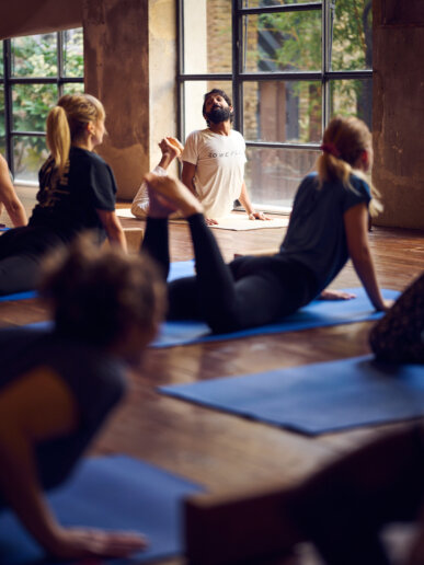 London Event Photographer photographing a yoga workshop