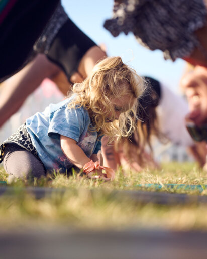 Fun vibes captured by a yoga photographer at a festival